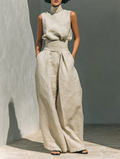 Set consisting of a sleeveless blouse and wide-leg pants made of a cotton-linen blend.